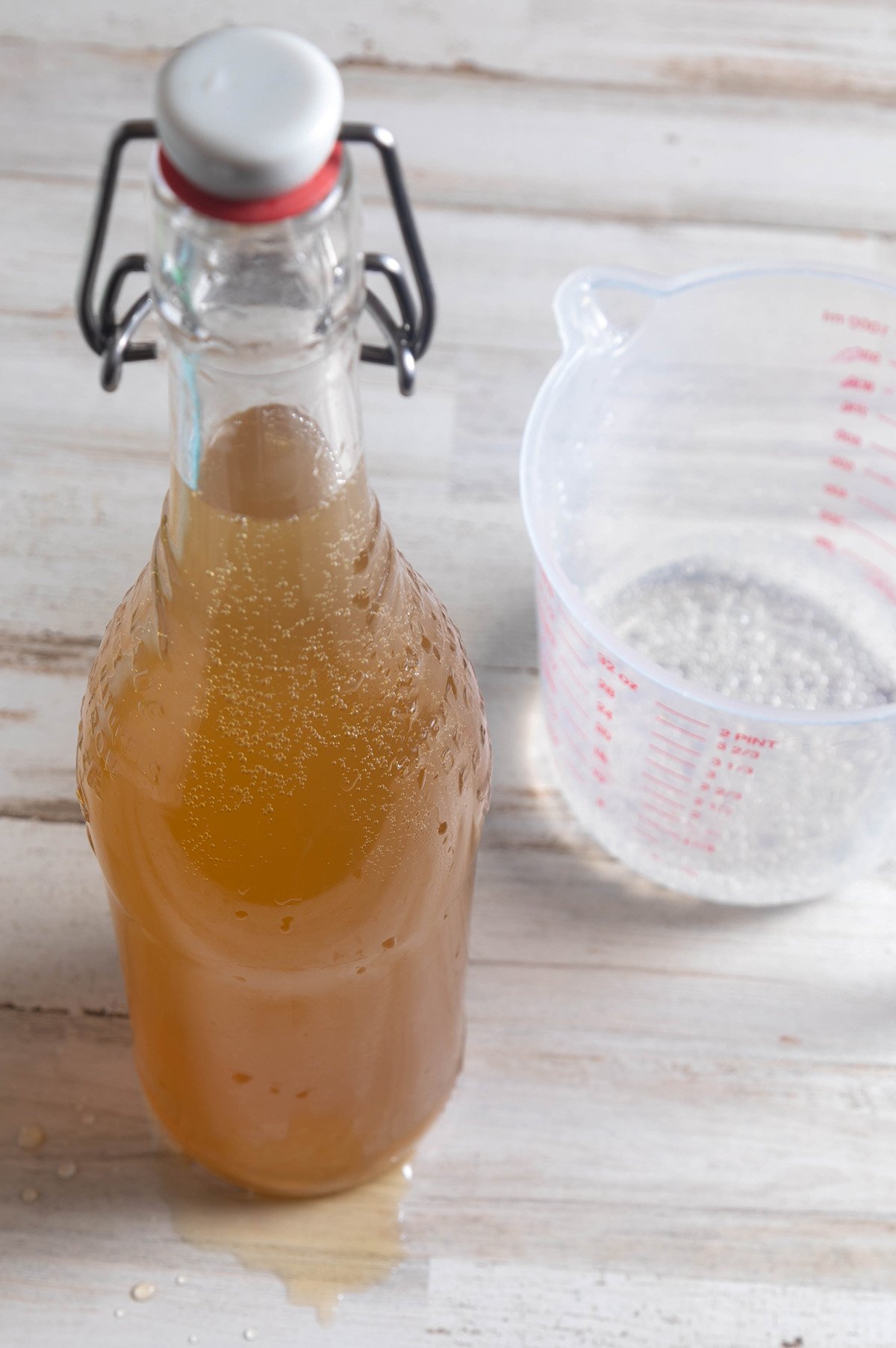 Made-from-scratch ginger beer in tall glass bottle