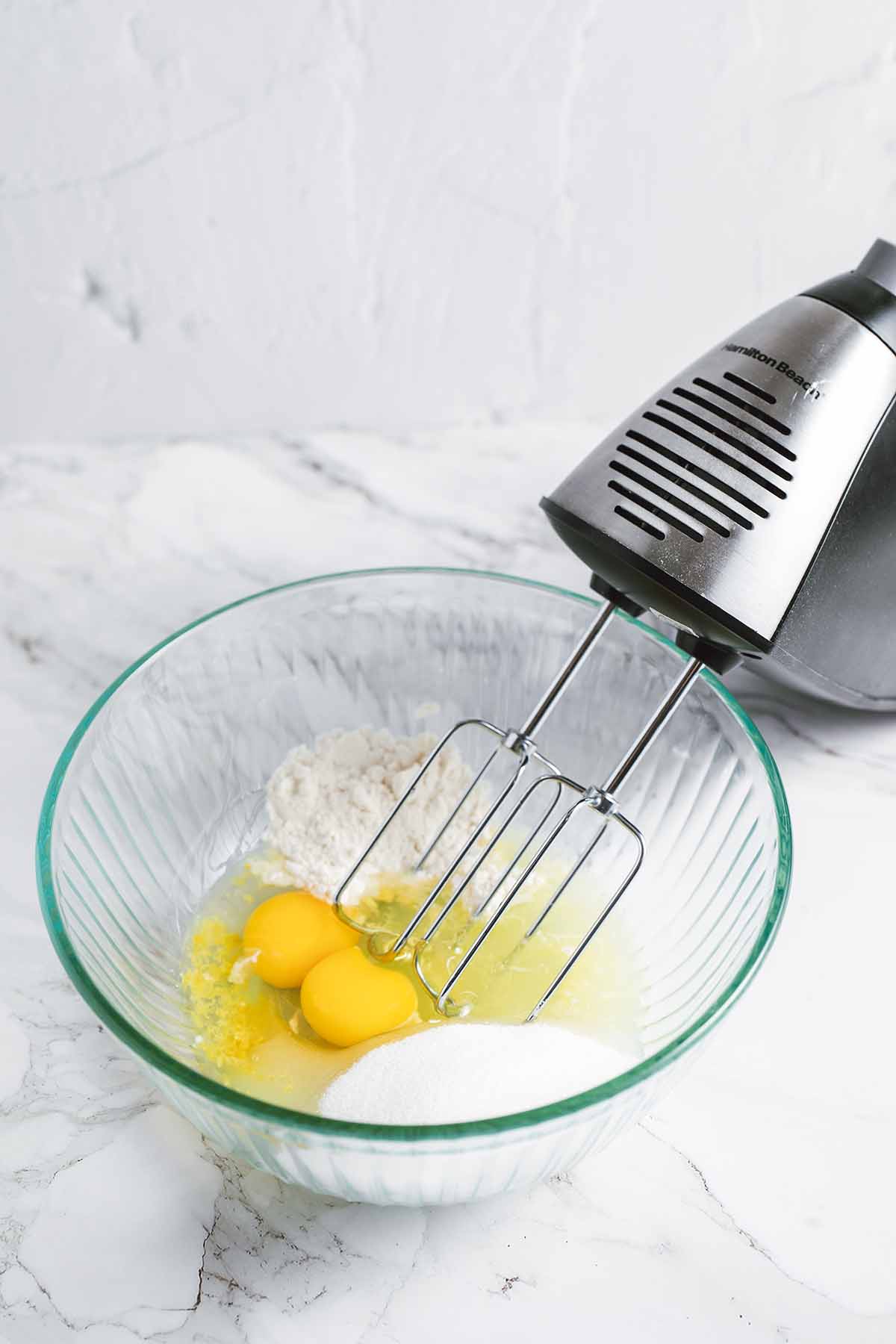 use electric mixer to mix ingredients